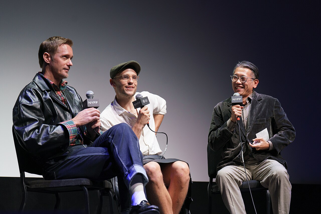 Alexander Skarsgård Plays a Husband Made of Wicker, and Somehow It Works - File:Dennis Lim with Alexander Skarsgård and Harry Lighton at the New York Film Festival 2025.jpg