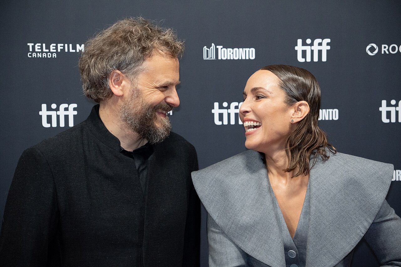Noomi Rapace Is Hunting Terrorists in Alaska Now - File:Jaap and Noomi - In Alaska - TIFF 2026-2.jpg