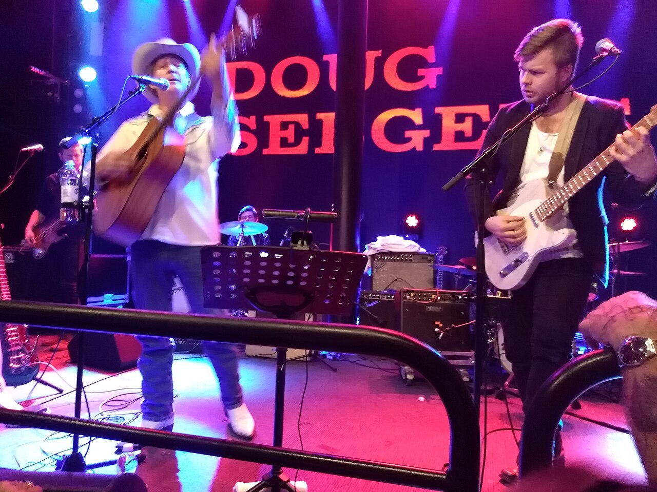 Doug Seegers playing guitar during the Viking Cinderella show in 2018